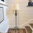 Antique French Baroque Revival Gilt Metal Floor Lamp with Wrought Iron Scroll Base and Decorative Foliate Detail
