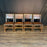 French Antique Set of Leather and Nailhead Dining Chairs with Bobbin Legs