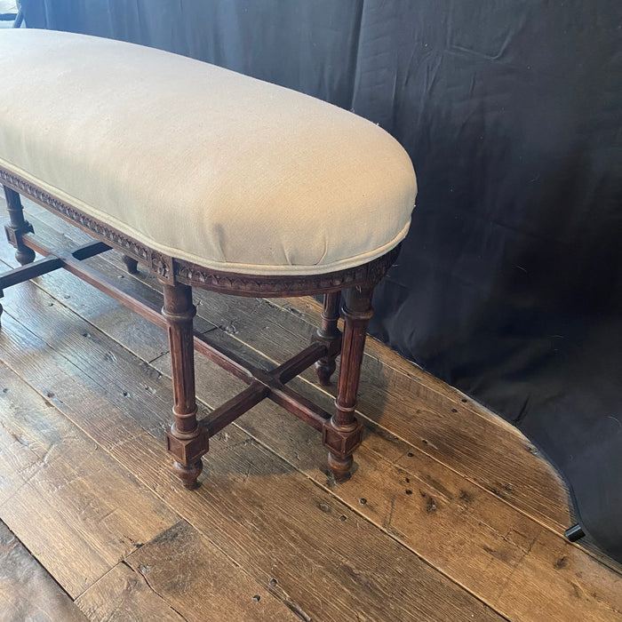 19th Century French Louis XVI Carved Walnut Oval Bench or Ottoman with New Upholstery