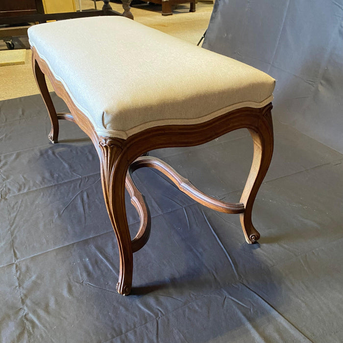 Classic French 19th Century Walnut Louis XV Newly Upholstered Bench with Carved Circular Stretcher