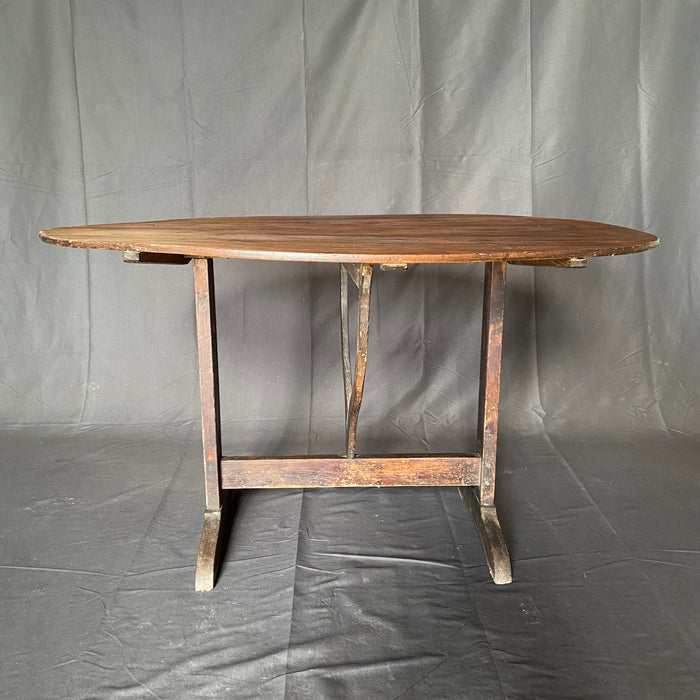 Large Oval French Early 19th Century Vigneron or Tilt-Top Walnut 'Table De Vendange' or Wine Tasting Table with Lovely Walnut Patina