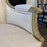 Pair of Intricately Carved French 19th Century Painted Louis XVI Bergere Armchairs with New Neutral Upholstery