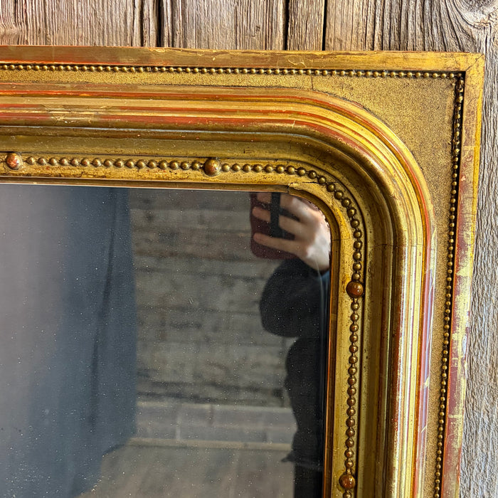 Exquisite 19th Century French Louis Philippe Large Giltwood Mirror with Rich Original Gold Leaf Gilding, Elegant Molded Frame and Beaded Detail