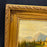 19th Century French Oil Painting of an Alpine Lake Landscape with Hilltop Castle and Horseback Riders in Ornate Gilt Frame