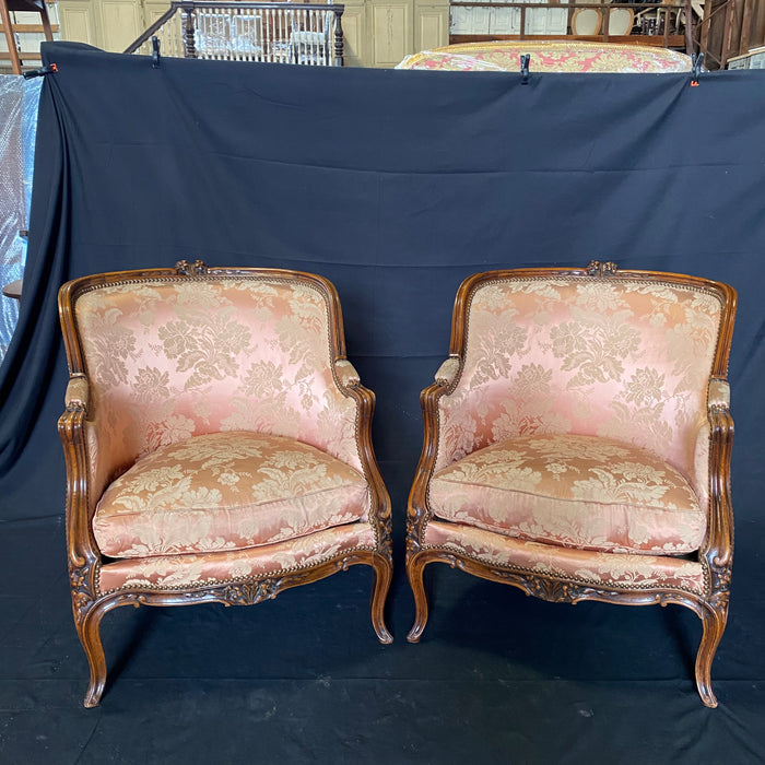 Exquisite Pair of Antique Louis XV Carved Walnut Bergere Chairs or Armchairs with Brass Tack Detailing