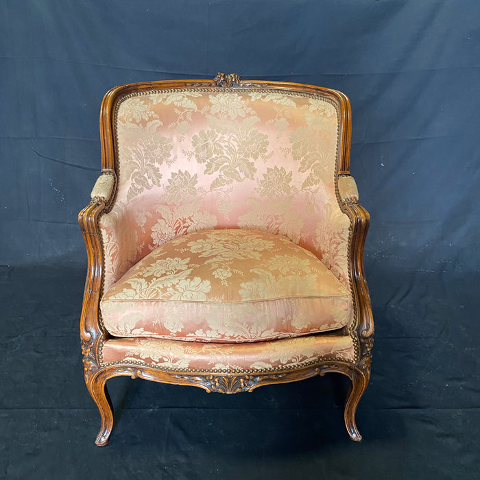 Exquisite Pair of Antique Louis XV Carved Walnut Bergere Chairs or Armchairs with Brass Tack Detailing