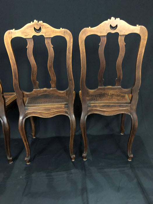 Set of Four French Louis XV Pressed Leather Carved Chairs