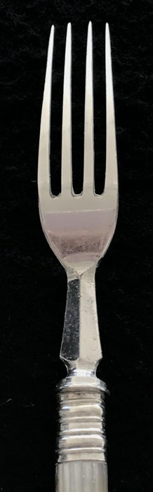 Antique silver fork with a mother of pearl handle 