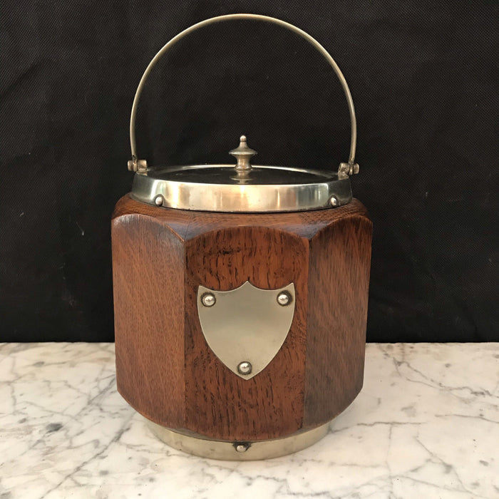 Wooden biscuit barrel or ice bucket with silver details and a silver crest
