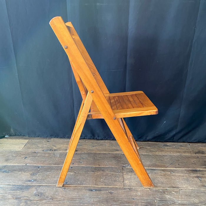 Set of 12 Mid-century vintage wooden stackable folding chairs from Paris, Maine from the 1940s
