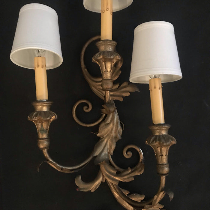 Antique Italian gold three arm wall sconce with shades