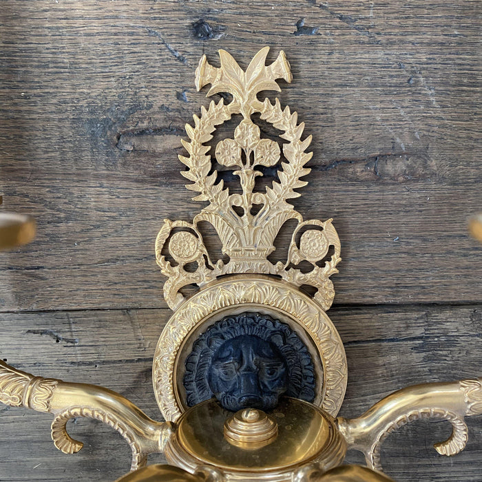 Pair of French Empire Style Brass Wall Sconces with Lions Heads and Four Arms