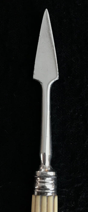 Antique silver pick with a bone handle 