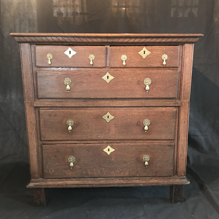 Antique oak chest of drawers with brass pulls