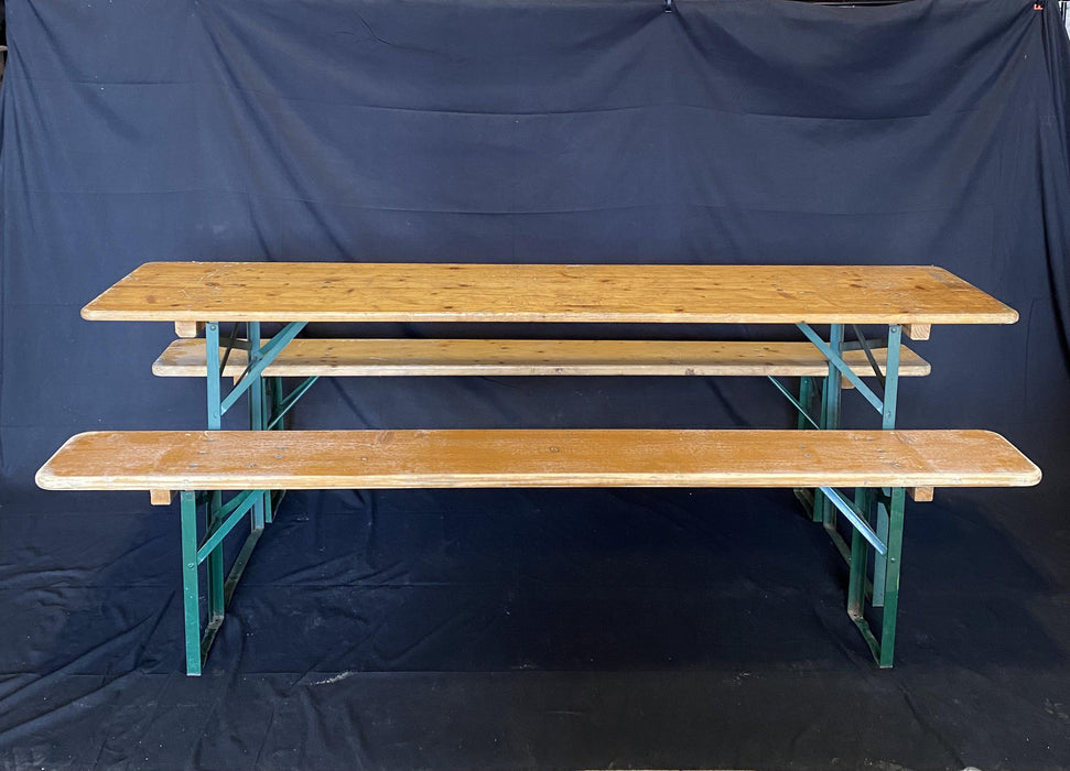 Picnic style brown folding table with two folding benches