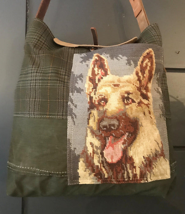 Vintage green shoulder bag with an embroidered german shepherd dog on the front