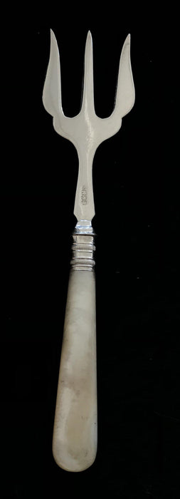 Antique silver bread fork with mother of pearl handle