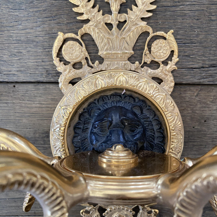 Pair of French Empire Style Brass Wall Sconces with Lions Heads and Four Arms