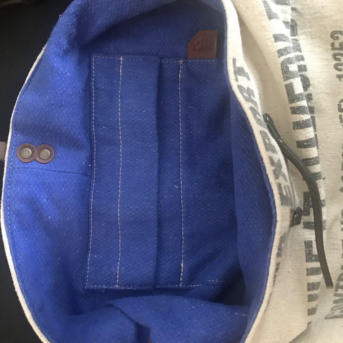 Vintage shoulder bag made from a flour bag with a leather strap