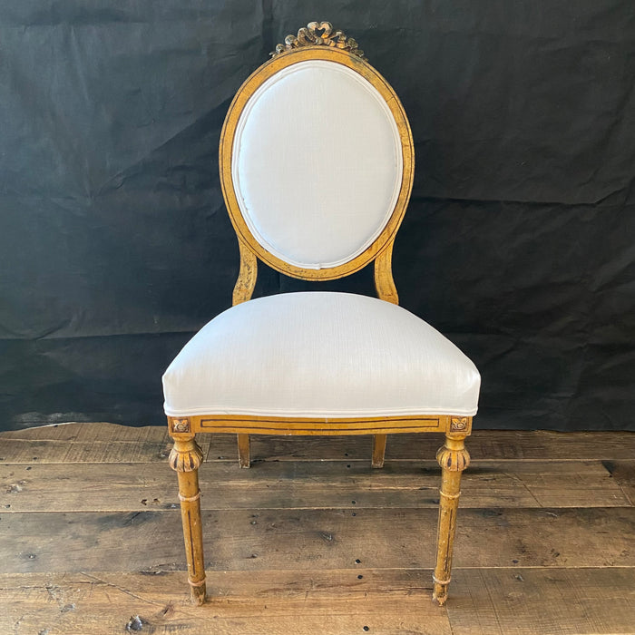 Antique gold round back chairs with white upholstery 