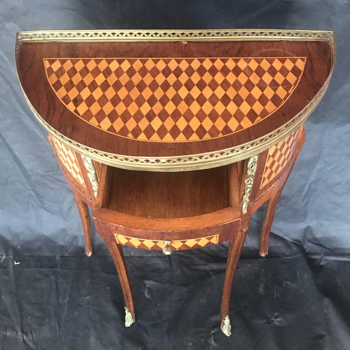 Antique marquetry side table with brass details 