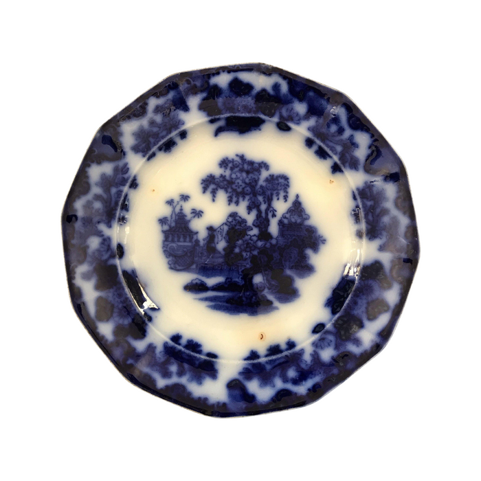Antique blue and white plate with oriental pattern