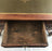 Antique French empire style desk with a leather top