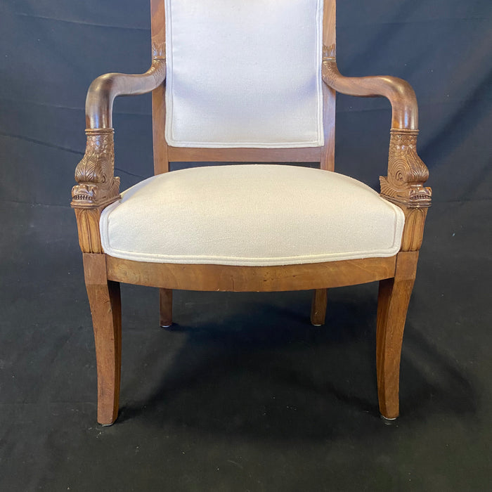 Period French Empire Carved Walnut Armchairs with Intricate Dolphin Armrests