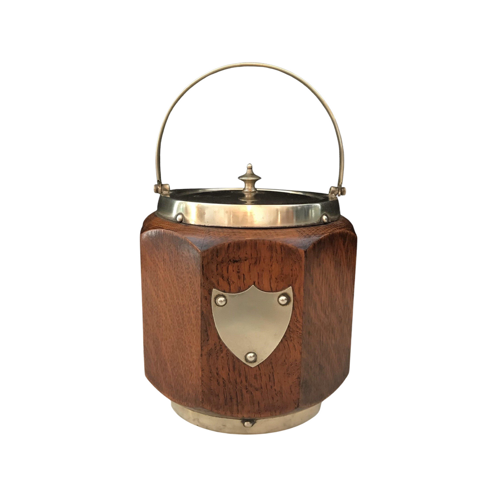 Wooden biscuit barrel or ice bucket with silver details and a silver crest