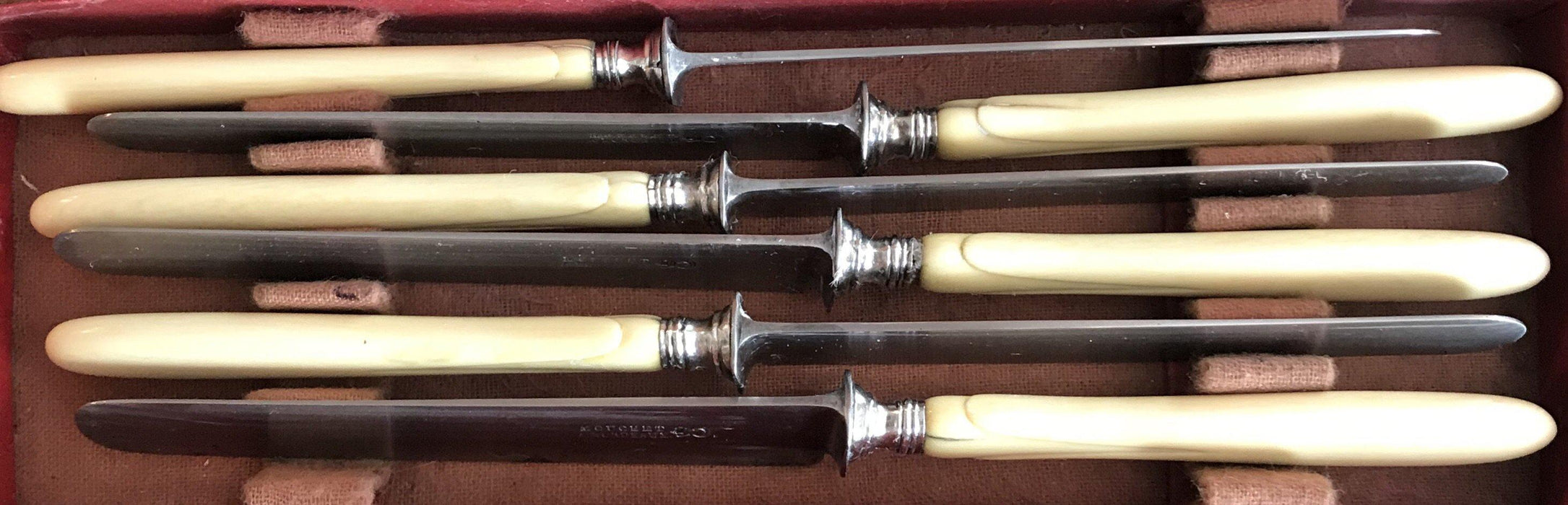 Antique silver set of knives in original box 