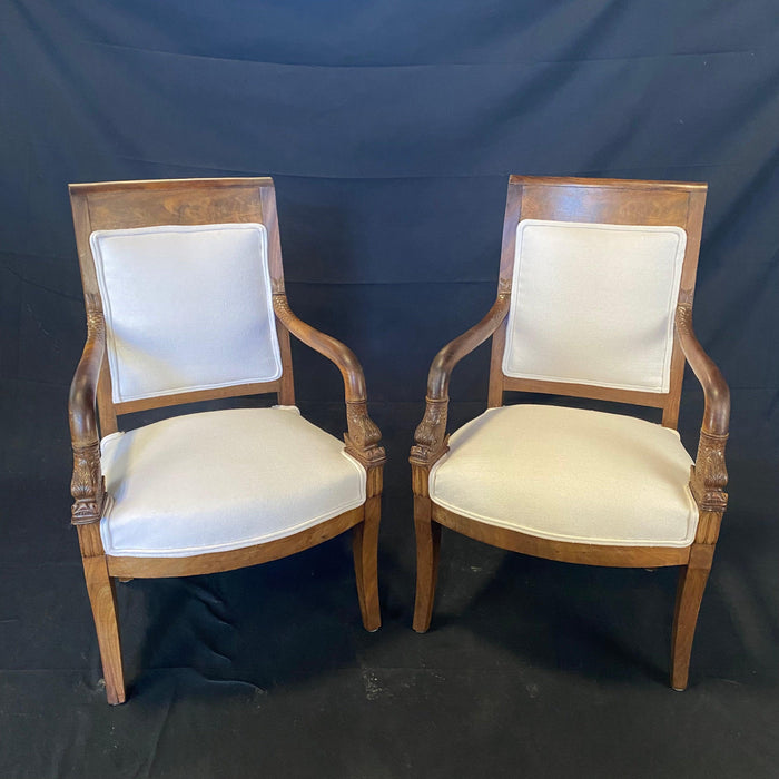 Period French Empire Carved Walnut Armchairs with Intricate Dolphin Armrests