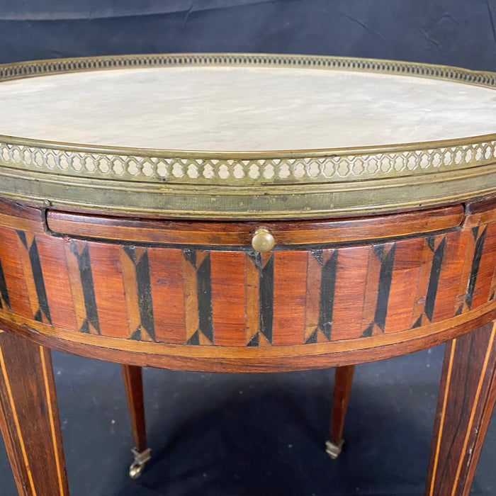 French Louis XVI Period Marble Top Bouillotte Table with Elaborate Marquetry and Bronze Gallery