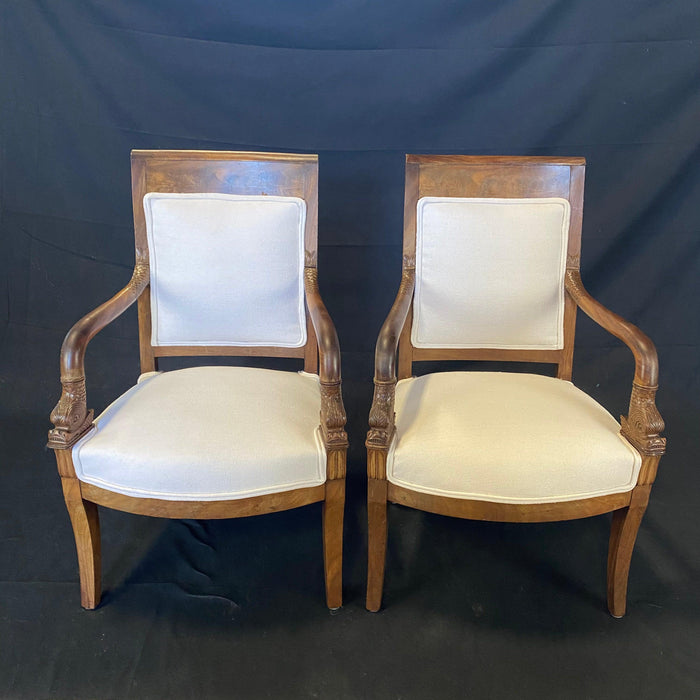 Period French Empire Carved Walnut Armchairs with Intricate Dolphin Armrests