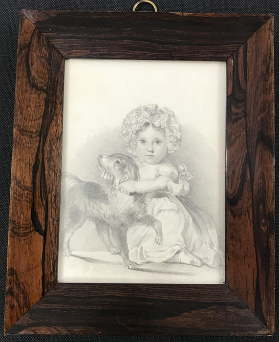 Antique drawing of a child and a dog in a wood frame 