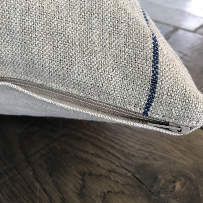 Designer linen pillow with blue stripes 