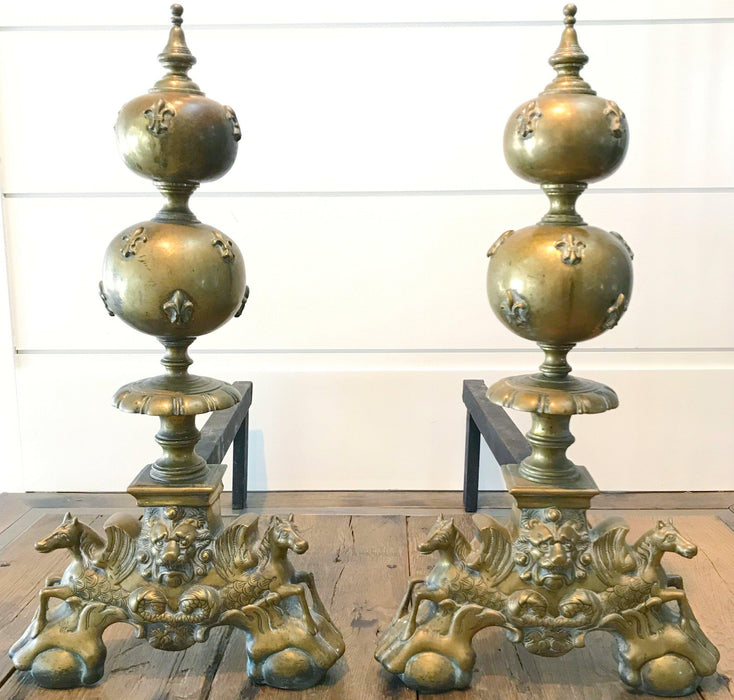 Antique brass andirons with lion and horse details 