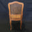 Set of Four French Walnut Carved Cane Dining Chairs
