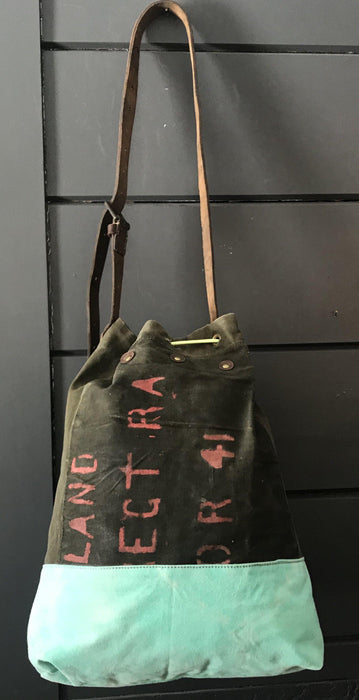 Vintage green and blue striped shoulder bag with an ammo pocket on the outside and a leather strap
