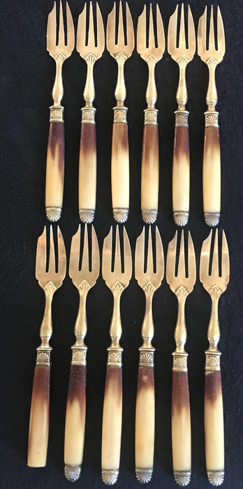 Antique gold and silver fork set 