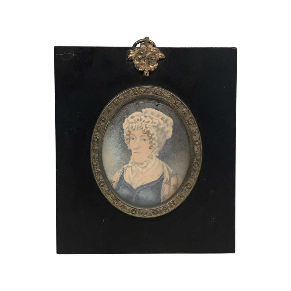 Antique painting of a woman in a black frame with gold details