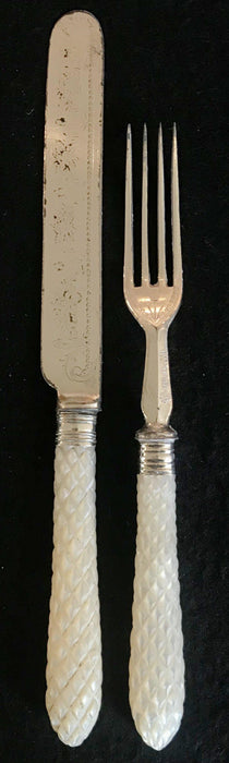 Antique silver fork and knife set with mother of pearl handles 