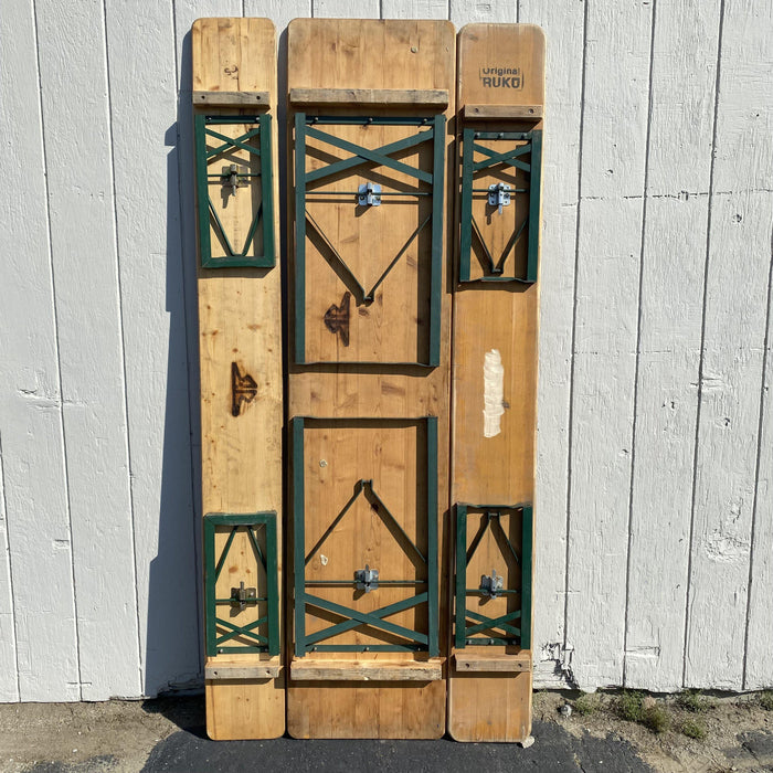 Picnic style brown folding table with two folding benches