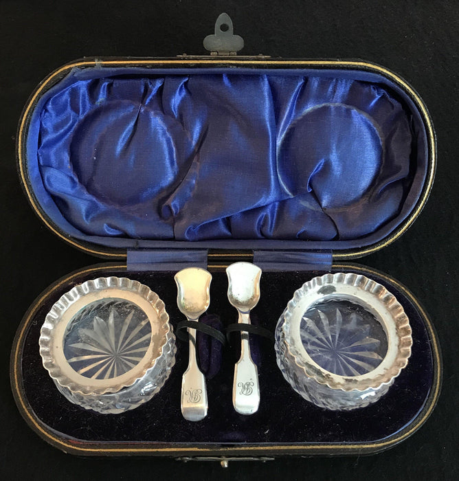 Antique crystal salt and pepper dishes with two mini silver spoons in original case