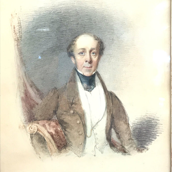 Antique watercolor of a man in a burled wood frame 