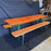 Picnic style orange painted wood folding table with two benches 