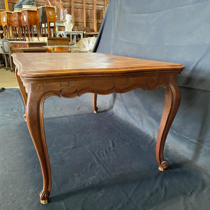 19th Century French Louis XV Carved Dining Table with Two Leaves