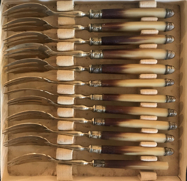 Antique gold and silver fork set 