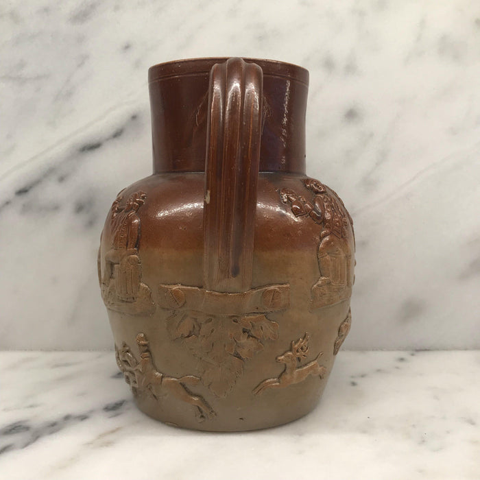 Antique brown pitcher with farm scene 