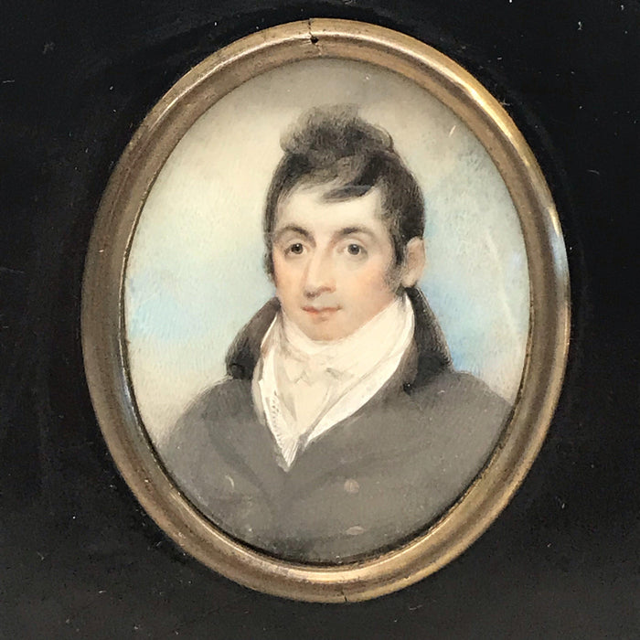 Antique painting of a man in a ebony black frame 
