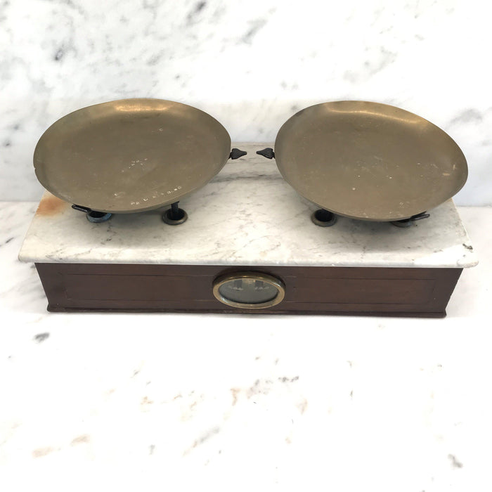 French wooden scale with a marble top and brass scales